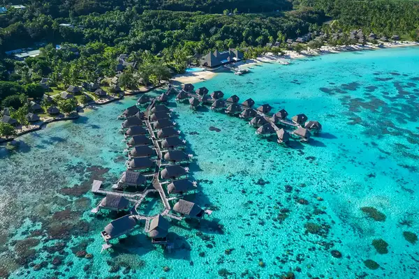 Aerial view of the overwater bungalows at Sofitel Kia Ora Moorea