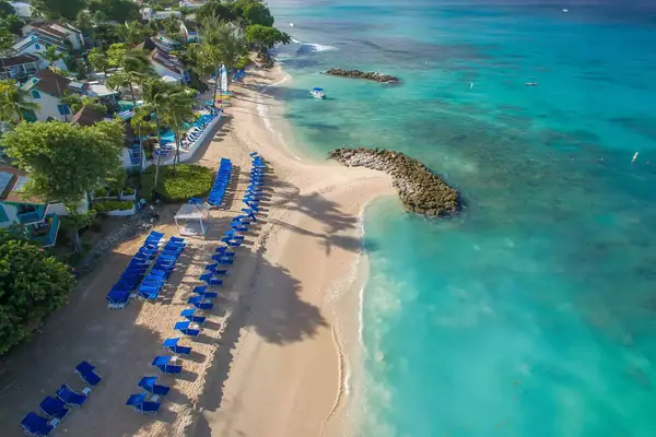 Aerial view of beach and blue beach chairs at Crystal Cove