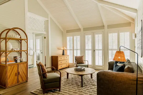 A living room inside the accommodations at Soho House Canouan