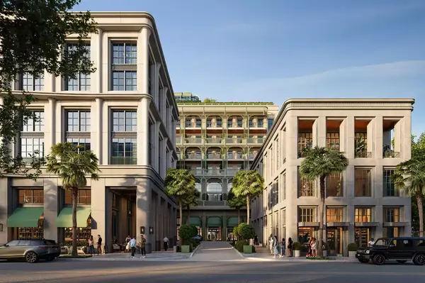 A view of the Four Seasons Hotel Charleston, showing its facade and surrounding architectural elements