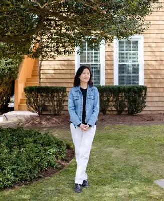 Hotelier Sylvia Wong stands outside of her Roundtree hotel in New York