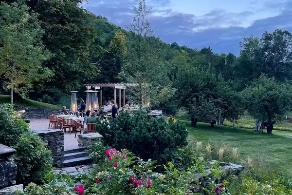 An outdoor dining patio at Twin Farms 