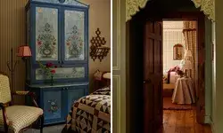 A cozy room with a bed, decor, and a painted wooden wardrobe, connected to another room through an arched doorway