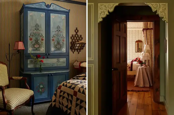 A cozy room with a bed, decor, and a painted wooden wardrobe, connected to another room through an arched doorway