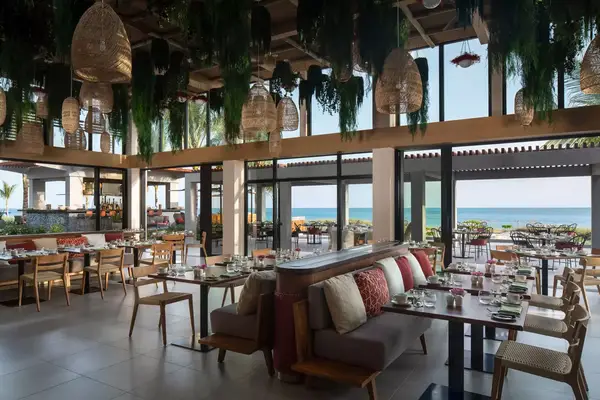 large restaurant with ocean views and open windows