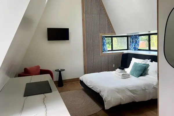 Finger Lakes Treehouse & Spa, a-frame cabin interior bedroom