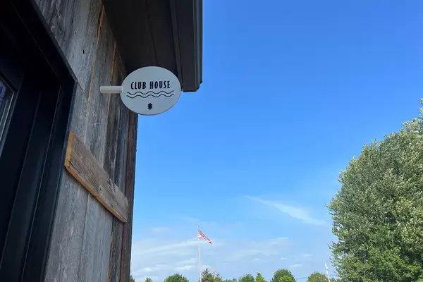 Finger Lakes Treehouse & Spa clubhouse exterior sign