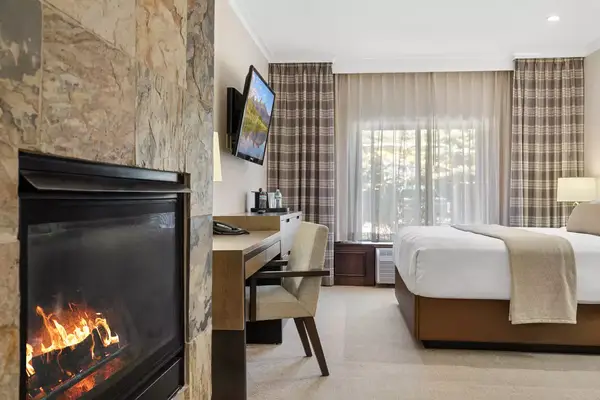 Guest room with a fireplace