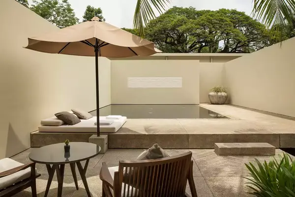 Plunge pool and lounge chairs in the pool suite at Amansara