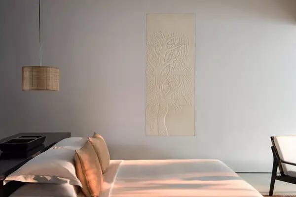 Suite bedroom space with sunlight coming at Amansara