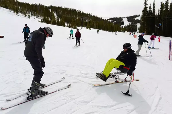 A double amputee learning to ski in Winter Park, Colorado