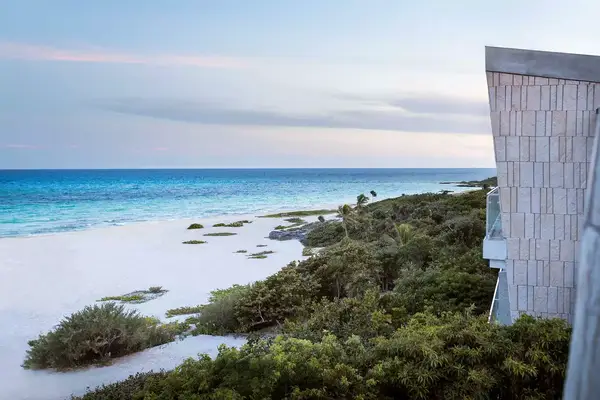 Exterior of the beach-facing Palmaia, the House of AIA resort in Mexico