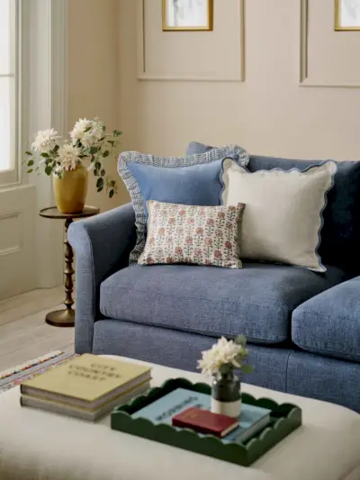 living room with blue sofa