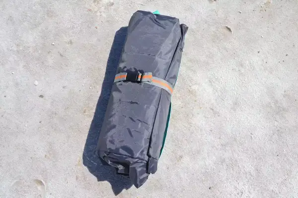 WhiteFang 3-Person Beach Tent folded up on the beach