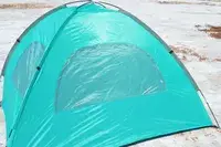 Backside of the WhiteFang Beach Tent on a beach