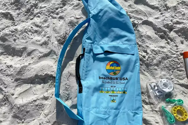 beachBUB All-In-One Beach Umbrella System carrying case on sand