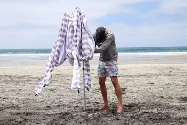 A person collapses the CoolCabanas CoolCabana 5