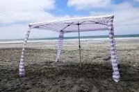 The CoolCabanas CoolCabana 5 on a beach after setup
