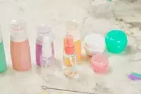 Morfone 16 Pack Travel Bottles displayed on marble counter