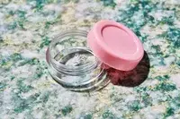 Vitog Travel Bottle sitting on a counter