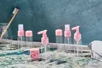 Vitog Travel Bottles sitting on a bathroom counter