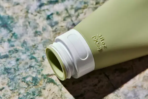 The INSFIT TSA Carry-on Approved Container without its cap