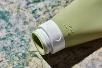 The INSFIT TSA Carry-on Approved Container without its cap