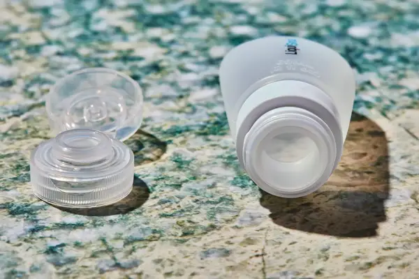 Liquisnugs Premium Leak-Proof Silicone Travel Bottles on granite countertop