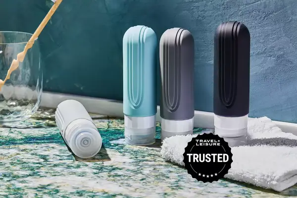 Mrsdry Travel toiletry bottles sitting on a bathroom counter