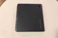 Kobo Libra Colour face down on a white surface