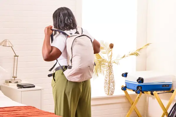 A person wears the Bellroy Lite Daypack