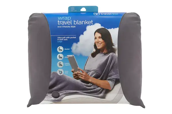 Person wearing a White+Warren Cashmere Travel Wrap around their neck over a winter coat