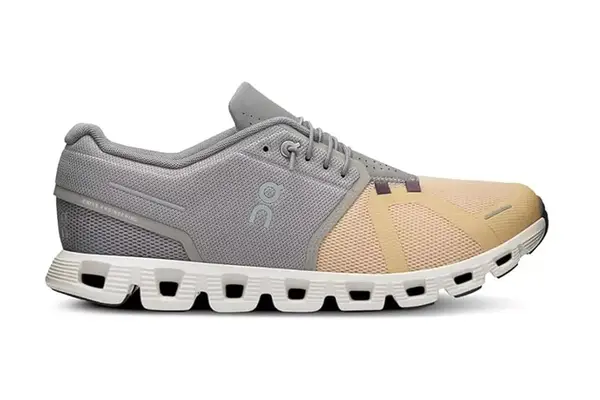 Side view of a man wearing a prAna Fleece Hoodie