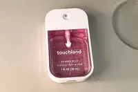 Touchland Power Mist Hand Sanitizer on a white surface