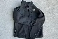 The North Face Denali Zip Jacket on a concrete floor