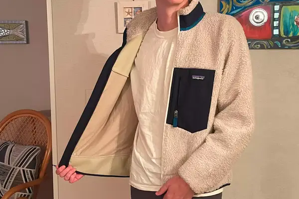 A person wearing the Patagonia Classic Retro-X Fleece Jacket, front-view