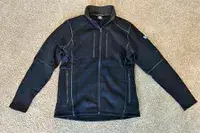 KUHL Interceptr Full-Zip Jacket on a carpeted floor