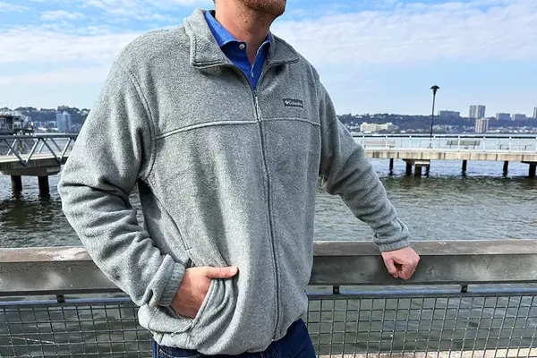 A person wearing the Columbia Steens Mountain 2.0 Full Zip Fleece Jacket outdoors