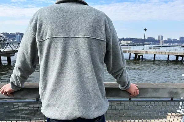 A person wearing the Columbia Steens Mountain 2.0 Full Zip Fleece Jacket outdoors