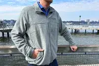 A person wearing the Columbia Steens Mountain 2.0 Full Zip Fleece Jacket outdoors