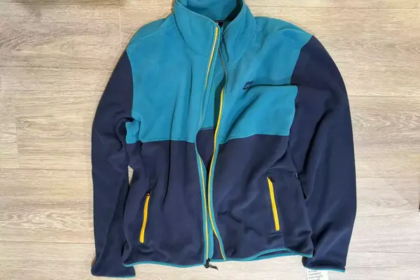 REI Co-op Trailmade Fleece on a wood floor