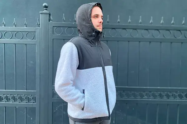 A person wearing the Helly Hansen Men’s Patrol Pile Fleece Jacket: