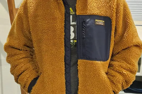 A person wearing the L.L.Bean Bean Sherpa Fleece Jacket, front-view
