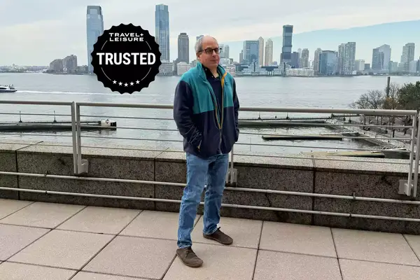 A person wearing the REI Co-op Trailmade Fleece outdoors