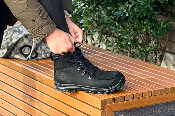A person ties the Timberland Men