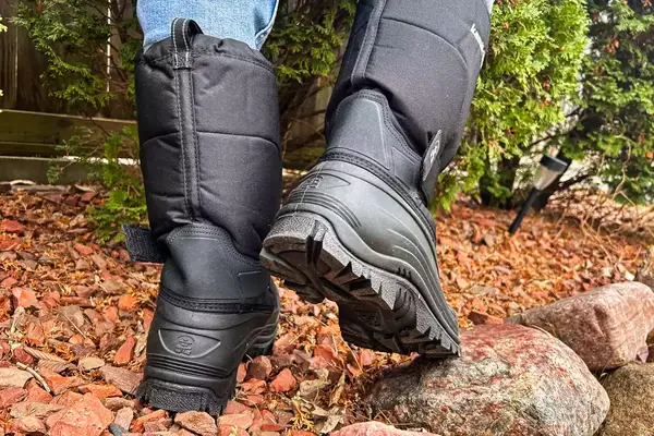 A person walks around while wearing the Kamik Men