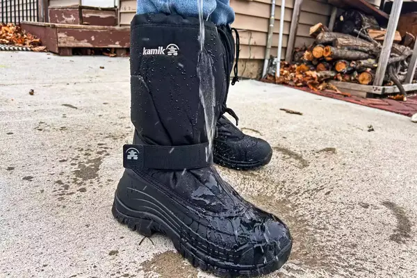 Water is poured onto a pair of Kamik Men
