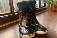The Sorel Menâs 1964 Pac Nylon Boots with the tag on