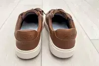 Kizik Women’s Vegas Sneakers on a wooden floor