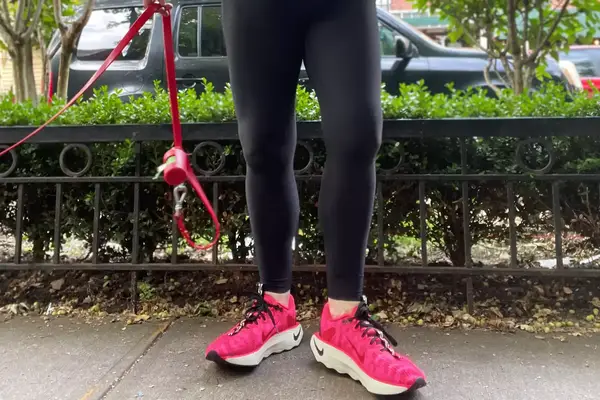 Feet wearing Nike Motiva Women